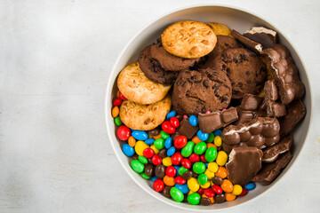 Chocolate candy on the white background, colorful candy texture.