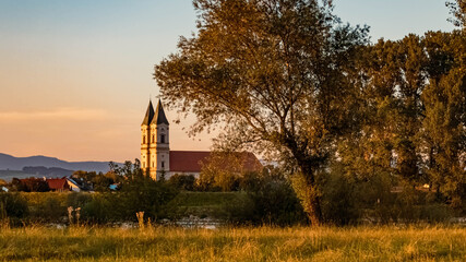 Beautiful sunset with the famous Niederalteich monastery at Thundorf, Danube, Bavaria, Germany