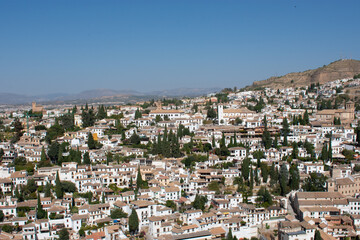 Fototapeta na wymiar Granada. Views of the city and the white houses. Granada Cathedral. Views of the Alhambra.