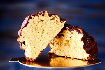 One chocolate marshmallow cut in half