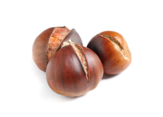Delicious sweet roasted edible chestnuts isolated on white
