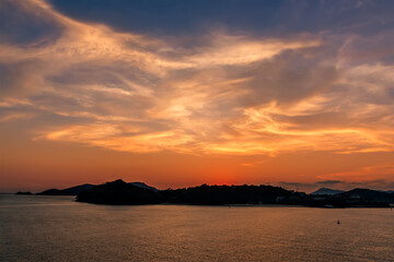 Fototapeta premium A view of the beautiful sunset over the island of Bali, Asia