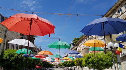 Obraz na płótnie Canvas Umbrellas on the street