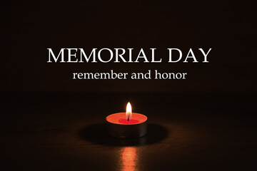 candle and fire - a symbol of memory and continuation of life. Memorial Day in the day of sorrow in...