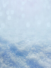 Natural winter Christmas background with sky, heavy snowfall, snowflakes in various shapes and drifts. Winter landscape with falling shining beautiful snow