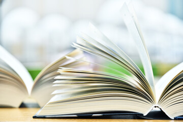 Books lying on the table in the public library