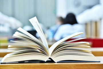 Books lying on the table in the public library