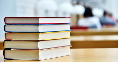 Books lying on the table in the public library