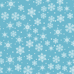 Snow seamless pattern. White snowflakes on blue background. Falling snow.