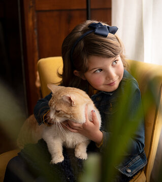 Young Girl with her Cat