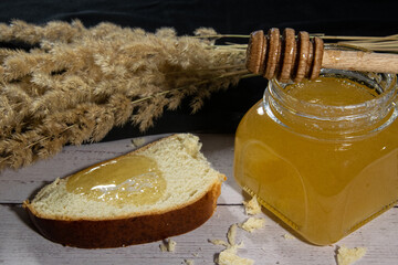 Fragrant, stringy honey spread on fresh bread