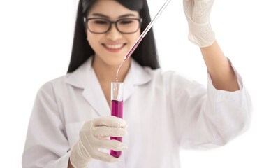 Young Asian scientist woman holding and looking at the chemical flasks in the laboratory	