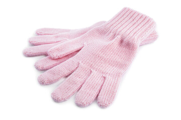 Pink woolen gloves on white background. Winter clothes