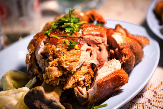 Pork hock in German with sauces delicious food. Deep fried pork knuckle ,Thai style serve with seafood sauce.