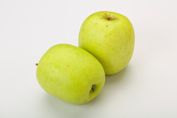 Two ripe green sweet apples