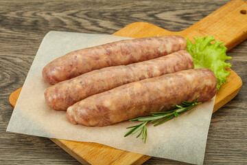 Raw pork meat sausages for grill