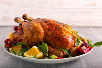 Roast whole chicken served on plate