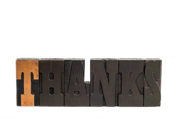 The word THANKS spelled out in antique letterpress type