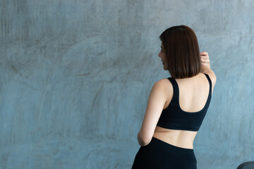 Close up asian beautiful sport girl on wall of gym,Thailand love health,Slim woman workout concept