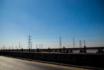 Fototapeta na wymiar Various views of power pylons in Kutch
