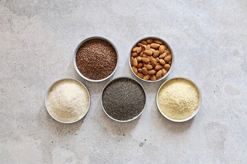 Super food dry ingredients group. Healthy, vegetarian, plant based, clean eating concept. Overhead view