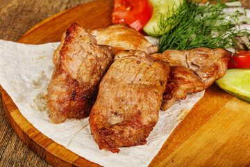Grilled pork shashlick served vegetables