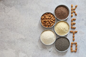 Super food dry ingredients group. Healthy, vegetarian, plant based, clean eating concept. Overhead view