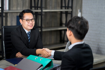businessman wearing formal suit interviewing new candidate for new employment position in the financial office. new normal work from home concept. 