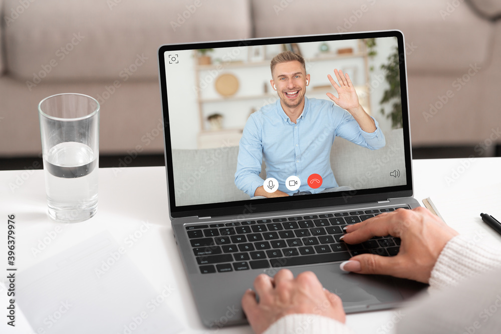 Aufkleber man learning via video call waving hello to teacher indoors