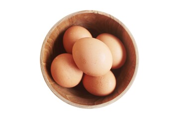 duck eggs in a wooden bowl on a white background