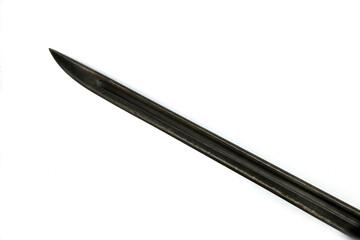 the edge of an antique blade on a white background