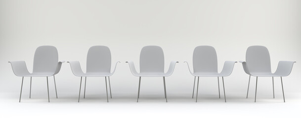 White chairs in one row in a white waiting room