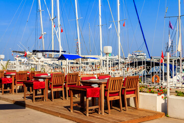 Cozy cafe in a sea harbour of Kemer (Kemer Marina)  on the Mediterranean sea in Turkey