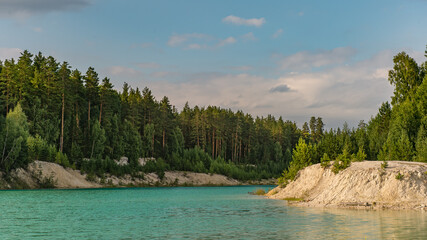 lake in the abandoned quarry in the forest