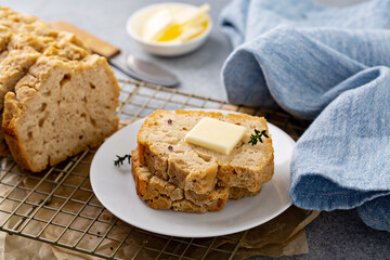 Beer bread on a cooling rack served with butter