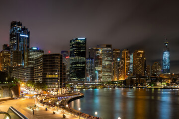 Sydney, New South Wales, Australia ; Sydney skyline illuminated at night.	