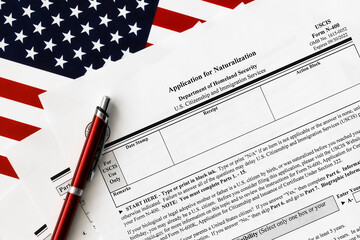 close-up of n-400 form. application for naturalization topview, on a background of United States...