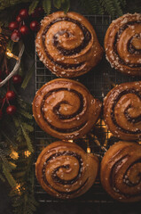 Fototapeta premium Cinnamon rolls with sugar for Christmas