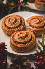 Fototapeta na wymiar Cinnamon rolls with sugar for Christmas