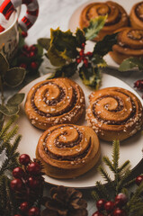 Obraz na płótnie Canvas Cinnamon rolls with sugar for Christmas