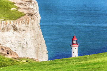 Fototapeta na wymiar Beachy Head Lighthouse with chalk cliffs near the Eastbourne, East Sussex, England