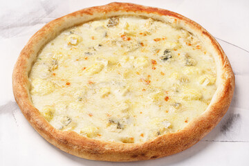 four cheese pizza with Mozzarella cheese, Dorblu, Brie, Parmesan cheese, sauce