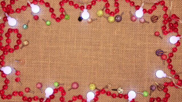 Christmas frame for an inscription with red beads. Background for the new year with an empty place under the text. Blank mock up template advertising, product, service or congratulations.