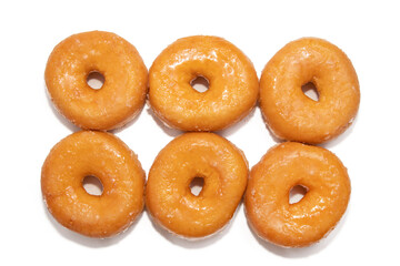 grouped fresh donuts isolated on white