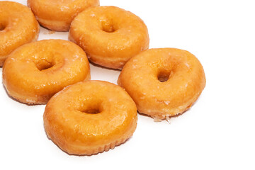 grouped fresh donuts isolated on white
