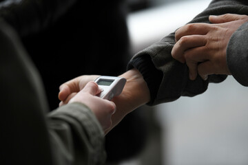 Visitors must go through fever measures using infrared digital thermometer check temperature...