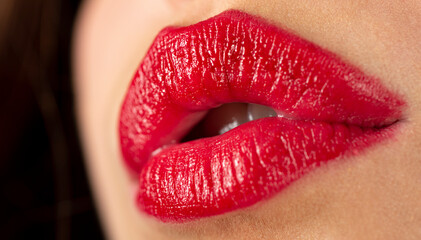 Sensual lips. Sexy lips kiss, kissing mouth. Passion kisses. Kissed on black background.