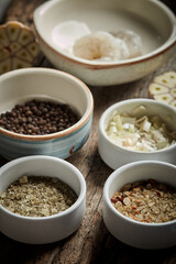 Ingredients for paella on the dark wood table