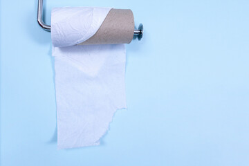 toilet paper on blue background