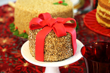 Christmas sweets and cakes. Decorate table with delicious Christmas sweets, chocolate and candys. Santa Claus, bear and others